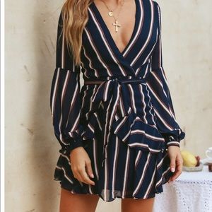 Never worn, cute navy striped long sleeve dress.